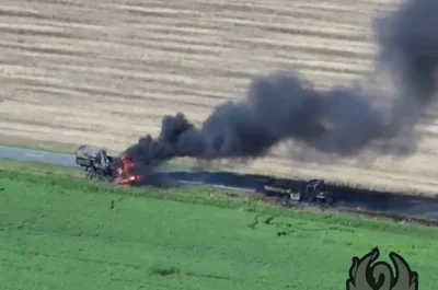 Daylight drone footage showed the trucks burning out