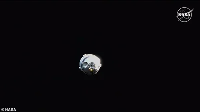 The capsule, seen in a live feed from NASA on Friday evening, suffered issues with its thrusters and helium leaks