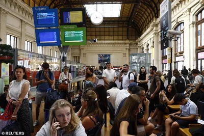 Passengers inside Gare de Bordeaux Saint-Jean station after threats against France's high-speed TGV network, ahead of the Paris 2024 Olympics opening ceremony