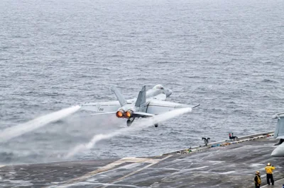 A US fighter jet taking off from the USS Theodore Roosevelt aircraft carrier during the Freedom Edge exercises.