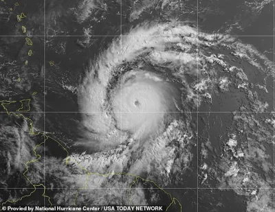 Hurricane Beryl (pictured) is closing in on the southeastern Caribbean and officials have warned that the 'extremely dangerous' storm could make landfall this morning