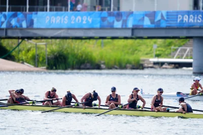 Great Britain’s Heidi Long, Rowan McKellar, Holly Dunford, Emily Ford, Lauren Irwin, Eve Stewart, Hattie Taylor, Annie Campbell-Orde, and cox Henry Fieldman after taking bronze in the women’s eight (Peter Byrne/PA).