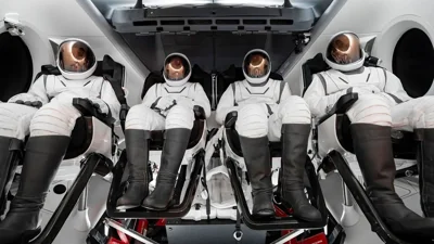 The crew of Polaris Dawn sat in their new EVA spacesuits.