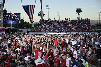 The crowd reacts as Republican presidential nominee former President Donald Trump speaks at a campaign rally in California, 12 October, 2024