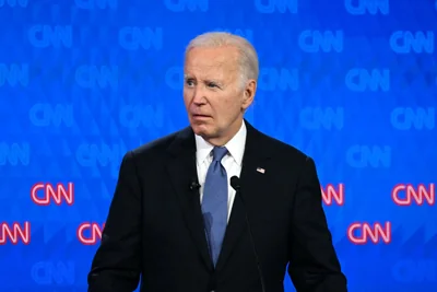 Biden looks on as he participates in the first presidential debate. His mumbling left many wondering if Democrats should put forward a different candidate in November