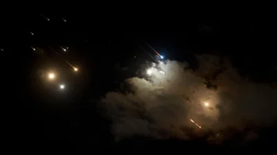 Moment hundreds of Iranian missiles fly over Israel – video