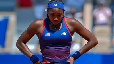 U.S. flag bearer tennis star Coco Gauff out of Olympics singles as disputed call leaves her in tears