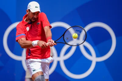 Novak Djokovic hits a backhand against Dominik Koepfer (Manu Fernandez/AP)