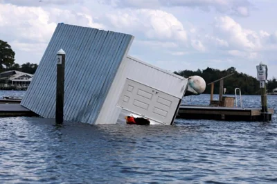 A building lays on its side after Hurricane Helene hit the area as it passed offshore  Sept. 27,  in Crystal River, Fla. AFP-Yonhap