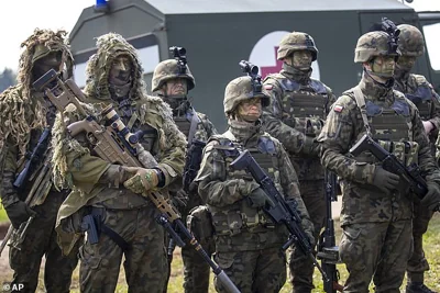 Polish Army soldiers take part in a Lithuanian-Polish Brave Griffin 24/II military exercise near the Suwalki Gap on April 26