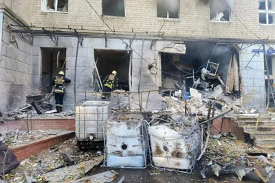 This handout photograph taken and released by the Ukrainian Emergency Service on September 28, 2024, shows rescuers inspecting a damaged hospital building following a drone attack in Sumy on September 28, 2024