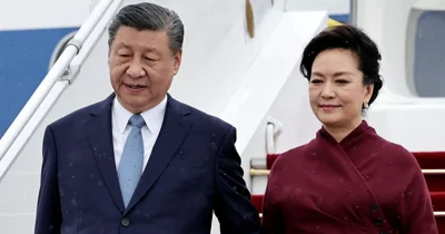 China's Xi praises French ties as Macron prepares to talk trade