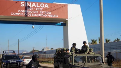 Soldiers patrol Sinaloa, Mexico a day after major anti-cartel operation.