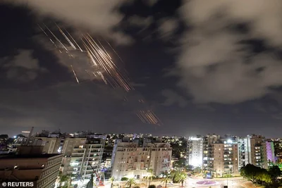 Israel's Iron Dome anti-missile system intercepts rockets, as seen from Ashkelon, on Oct. 1