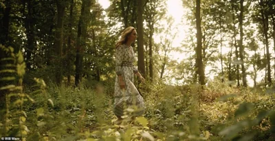 The princess walks through the woods under dappled sunlight during the video released alongside her statement