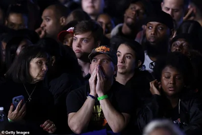 Vice President Kamala Harris' supporters react to election returns that show the Democrat falling behind former Republican President Donald Trump. Harris' supporters were gathered at her alma mater, Howard University, in Washington, D.C.