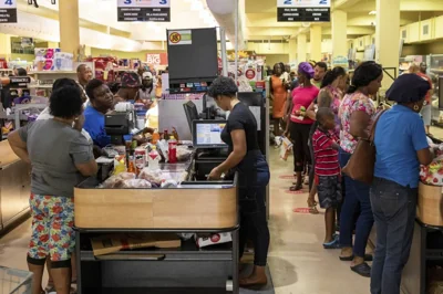 Costumers purchase groceries ahead of Hurricane Beryl in Arnos Vale, St. Vincent and the Grenadines, Sunday, June 30, 2024. AP PHOTO