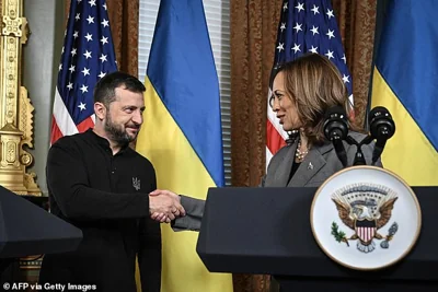 Ukraine's President Volodymyr Zelensky and Vice President Kamala Harris shake hands during a meeting at the White House