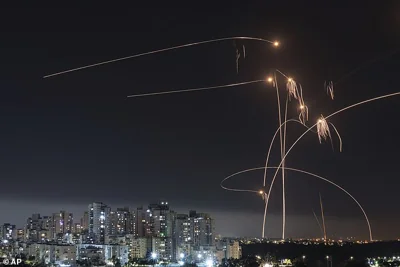 File image shows Israel's Iron Dome missile defense system fires interceptors at rockets launched from the Gaza Strip, in Ashkelon, southern Israel