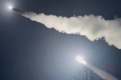 The missile rapidly blasted into the air and left a thick trail of smoke