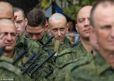 Russian reservists drafted during the partial mobilisation attend a ceremony before the leave for military bases, in Sevastopol, Crimea September 27, 2022