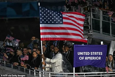 An image of LeBron James holding the American flag at the Olympics has become a meme