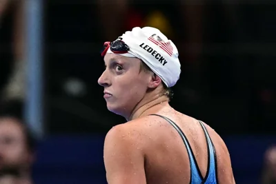 US' Katie Ledecky  reacts after a heat of the women's 800m freestyle swimming event during the Paris 2024 Olympic Games at the Paris La Defense Arena in Nanterre, west of Paris, on August 2, 2024. AFP PHOTO