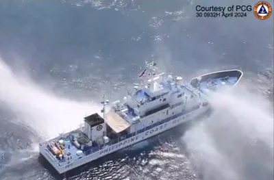 China Coast Guard Fires Water Cannons