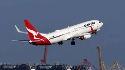 Qantas agrees payouts over &#039;ghost flights&#039;