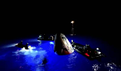 This image made from SpaceX video shows its capsule (center) carrying tech entrepreneur Jared Isaacman with his crew after it reached the Gulf of Mexico near Florida's Dry Tortugas early Sunday, Sept. 15, 2024. SPACEX VIA AP 