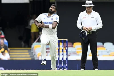 It came as Bumrah (left) took five wickets during Sunday's play at the Gabba, as Australia ended the day 405/7