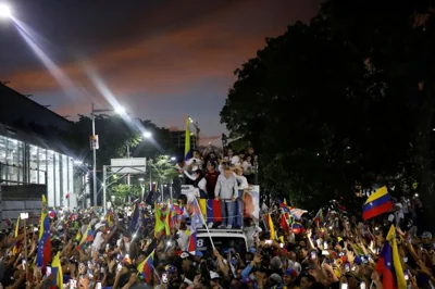 Huge crowds came out for the final election rally by Venezuela’s opposition ahead of the vote on Sunday, when they hope to end the decades-long rule of the socialist government.