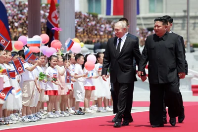 Russian and North Korean leader greet crowd