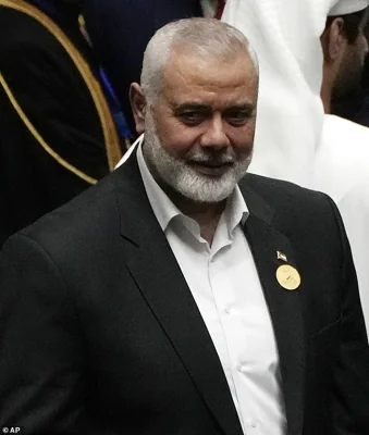 Hamas chief Ismail Haniyeh arrives at the Iranian parliament to attend the swearing-in ceremony of newly-elected President Masoud Pezeshkian, in Tehran, Iran, Tuesday, July 30, 2024