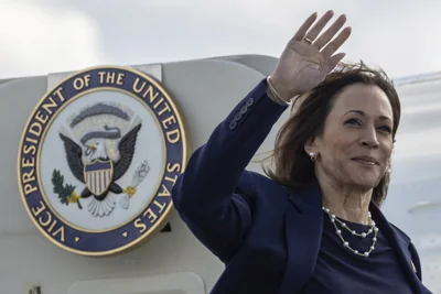 Vice President Kamala Harris waving