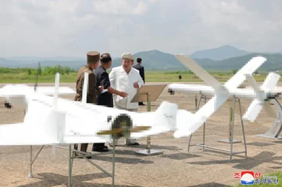 N. Korea's Kim orders mass production of suicide attack drones: KCNA