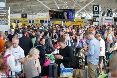 Passengers at Stansted Airport are left in chaos and without flight information following the worldwide IT failure