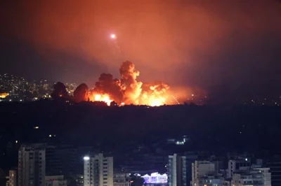 Smoke and flames rise over Beirut's southern suburbs after a strike, amid the ongoing hostilities between Hezbollah and Israeli forces, as seen from Sin El Fil, Lebanon, October 3