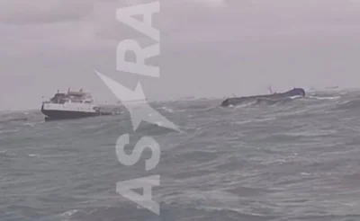 Footage shows one of the tankers split in half, its bow vertically in the water, upturned and sinking