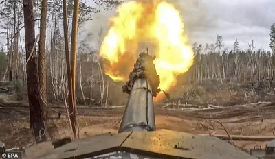 Russian T90M tank firing towards Ukrainian positions, at an undisclosed location in Russia