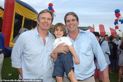 Scott Bessent is pictured alongside his husband John Freeman and one of their two sons, Cole Bessent Freeman. Pictured together in July 2012