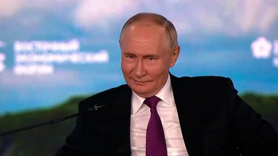 A smirking Vladimir Putin said Thursday he supported Kamala Harris in the upcoming US presidential election