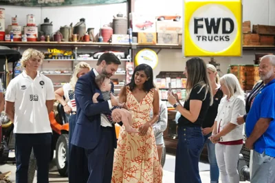 JD Vance holds a baby