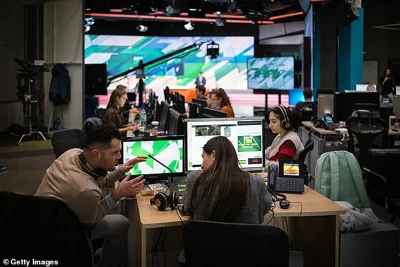 Employees of RT work in its international studio on December 6, 2019 in Moscow, Russia