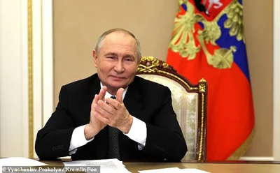 Russian president Vladimir Putin is pictured in the Kremlin during a remote ceremony to launch the Arktika-class nuclear-powered icebreaker Chukotka, November 6