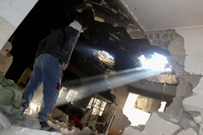 BEAM ME UP A man surveys the damage on a house hit during an Israeli airstrike in the city of Baalbek, in the Bekaa Valley of eastern Lebanon, on Oct. 21, 2024. AFP PHOTO