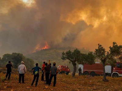 Greece battling wildfires amid high winds