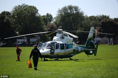An air ambulance at the scene of suspected multiple stabbings in Southport