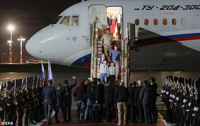 The Dultsev family, released after the Russian-US prisoner swap, disembark from a plane at an airport in Moscow, Russia, 01 August 2024