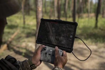 Ukrainian Soldier Operating a Drone 